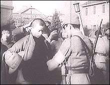 Japanese troops intensively searched for stragglers and plain-clothes soldiers. A scene from the film Nanking.